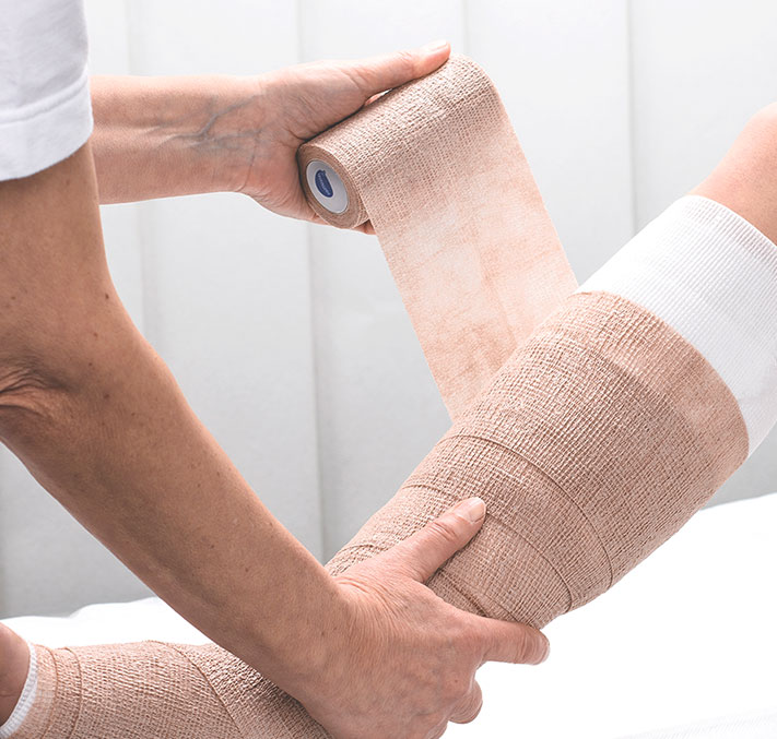 Kompressionsverband anlegen